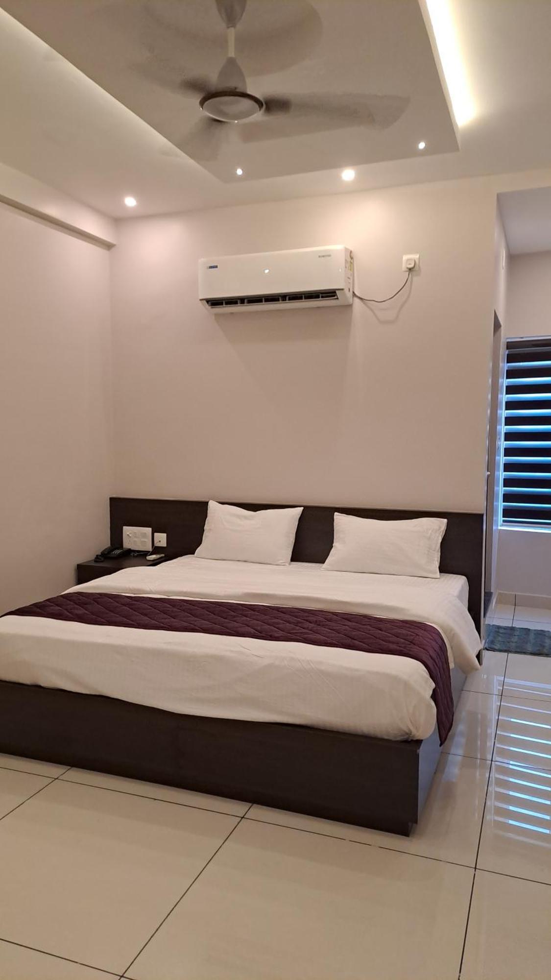 Aparthotel Capital Square à Erattupetta Extérieur photo